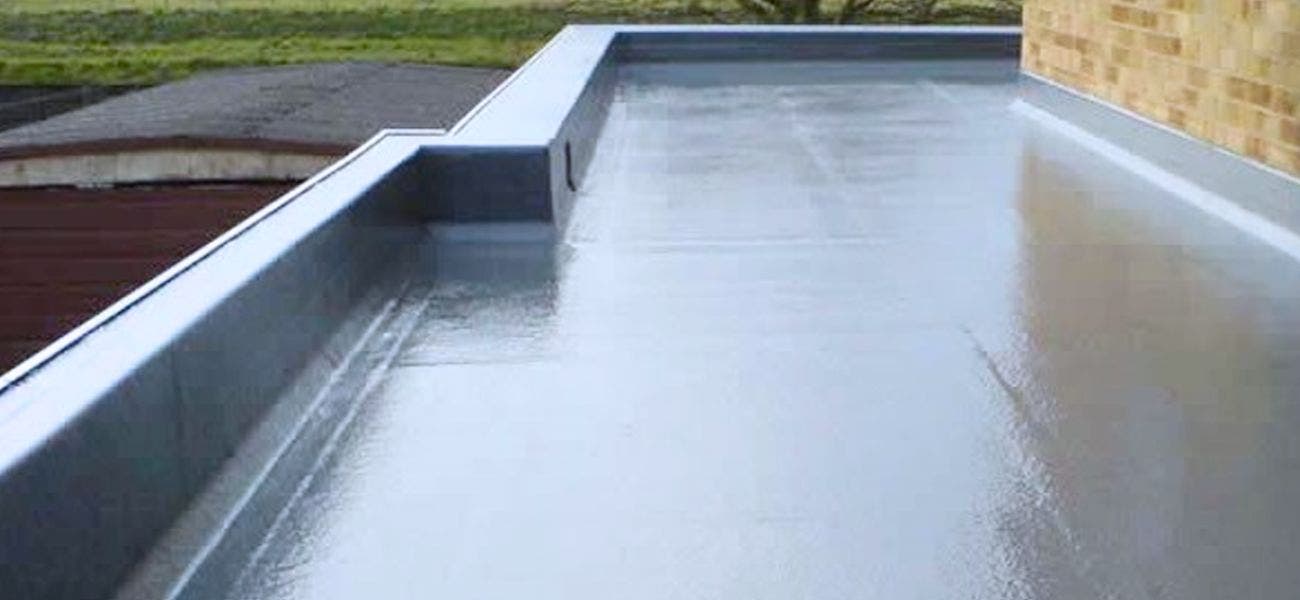 A gloss black flat GRP roof | GRP flat roofing 