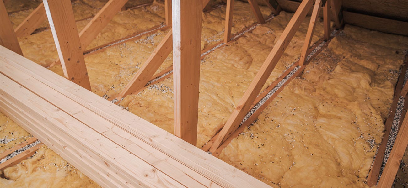 loft insulation spread on a loft floor