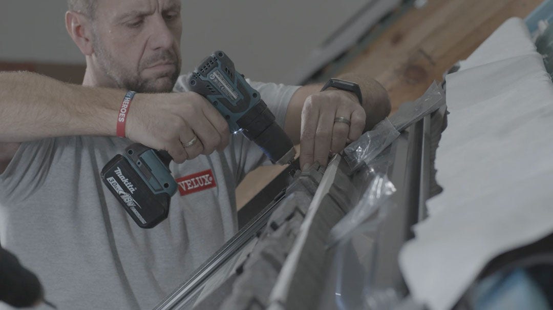 Velux Academy Trainer demonstrating the installation of a Velux pitched roof window