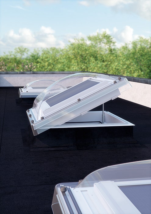 Flat roof dome windows in a line on the roof