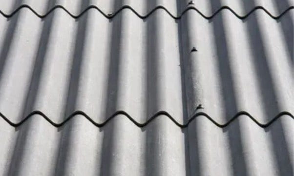 a close up photo of a fibre cement roof sheet